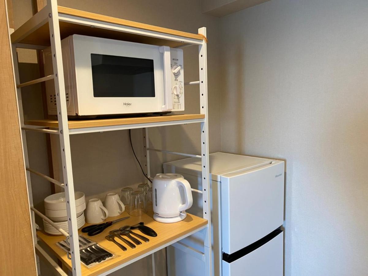 ホテルトーマスとまり Naha Bagian luar foto